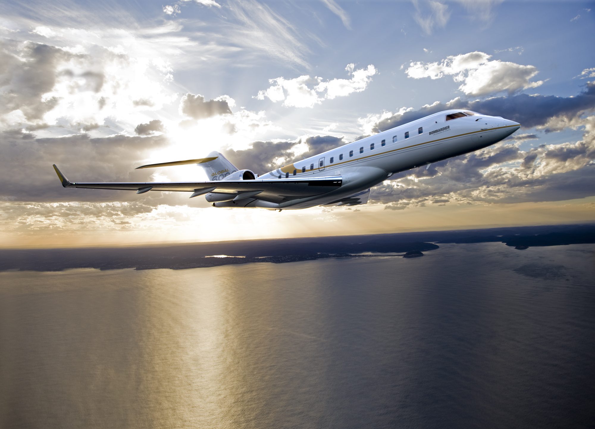 Bombardier Global 6000 in flight over the coast